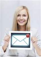 woman holding email invite on tablet