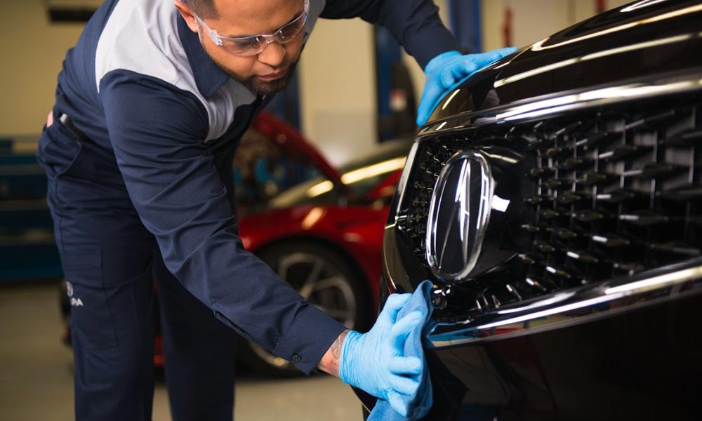 Acura Technician Polishing Car